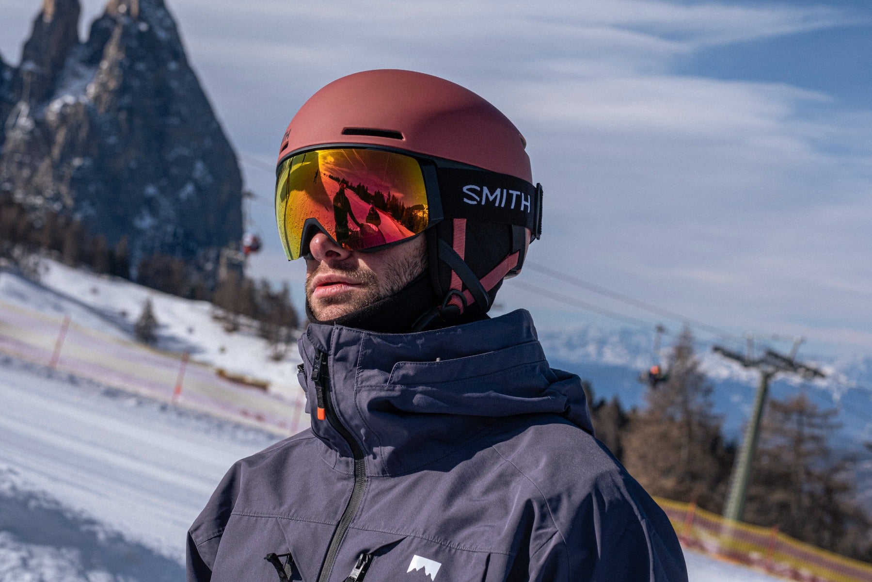 Skier wearing Smith I/O Mag ski goggles
