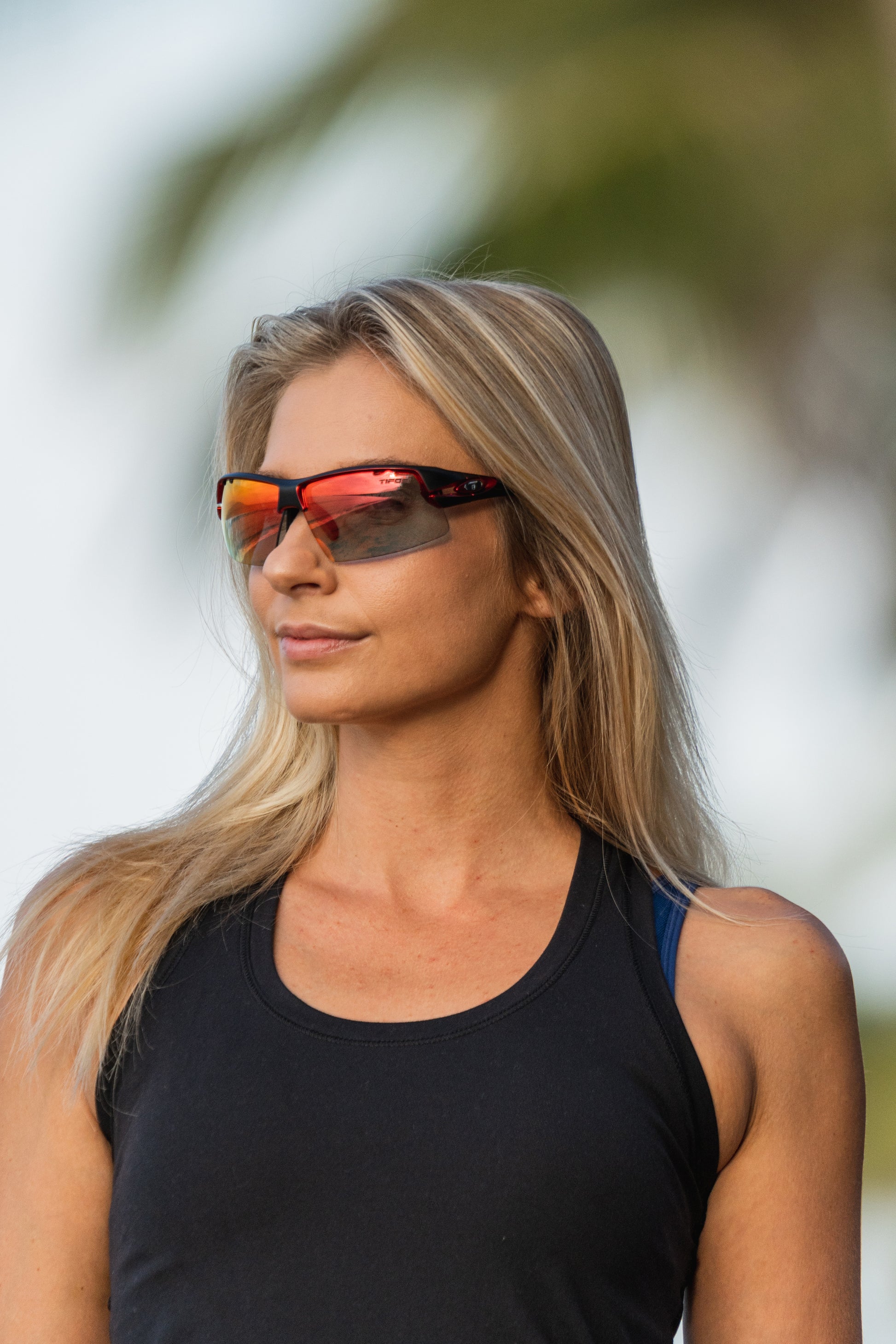 Woman wearing Tifosi Crit sunglasses