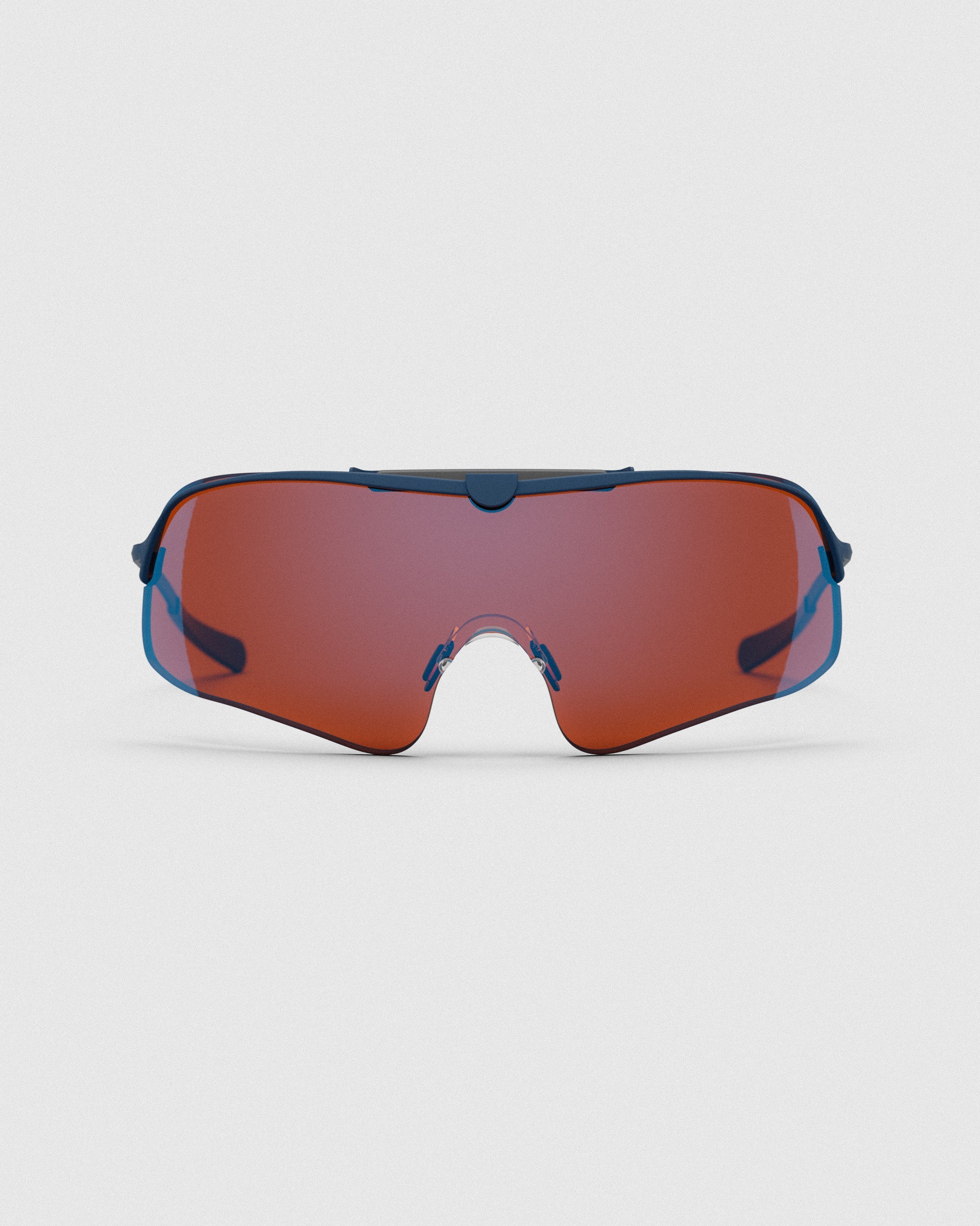 The Ranger Falcon Pro Shooting Sunglasses features a Navy Cerakote frame and a wrap-around Dark Amber shield lens to keep your eyes locked on clay targets in bright lighting conditions.