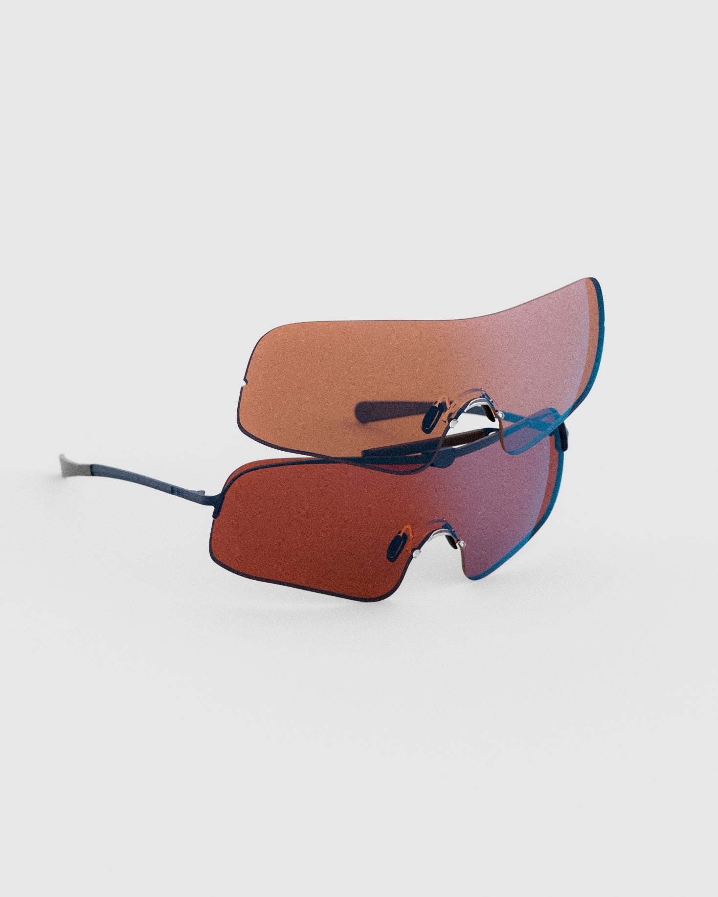 The RRanger Falcon Pro Shooting Sunglasses features a Navy Cerakote frame and interchangeable Light and Dark Amber shield lenses to keep your eyes locked on target across both shifting low-light and bright field conditions.
