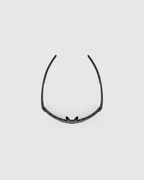 This is a top-down view of the Ranger Duster - Impact Dark night shooting sunglasses, showcasing the wraparound structure of the lightweight, full-rim TR90 frame.