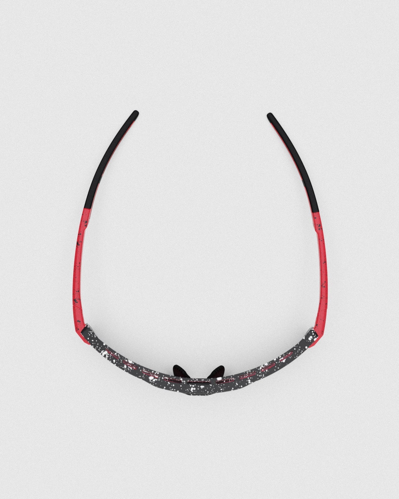 This is a top-down view of the Ranger Duster - Impact Red shooting sunglasses, showcasing the wraparound structure of the lightweight, full-rim TR90 frame.