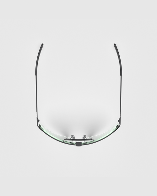 A top-down view showcases the ergonomic wrap-around profile of the matte black Ranger Falcon Pro Frame Shooting Sunglasses, highlighting the curved continuous shield lens, adjustable nose pads, and sleek temples designed for a secure fit.