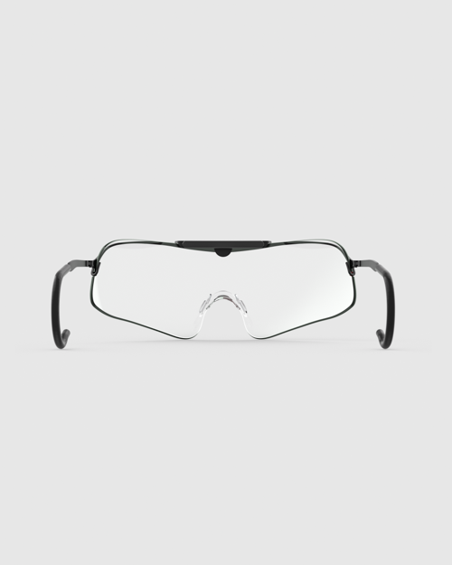 A front-facing view showcases the sleek design of the matte black Ranger Falcon Pro Frame Shooting Sunglasses, highlighting the curved continuous shield lens, adjustable clear nose pads, and flexible cable temples designed to wrap securely behind the ears.
