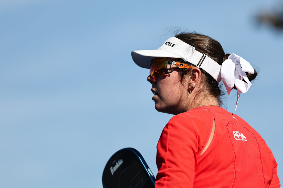 Professional Pickleball player wearing Pilla Zeus pickleball glasses