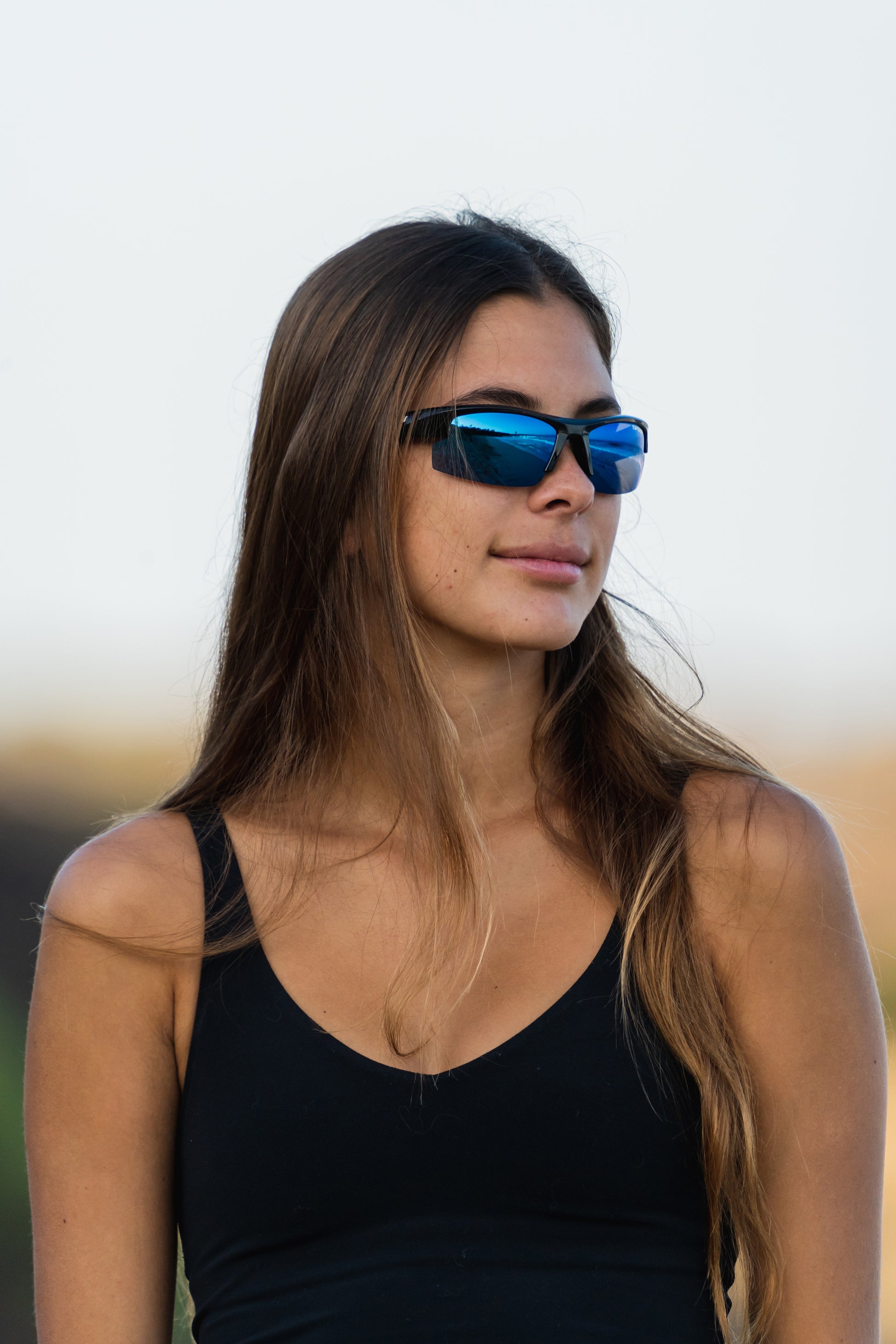 girl wearing Tifosi shutout sunglasses