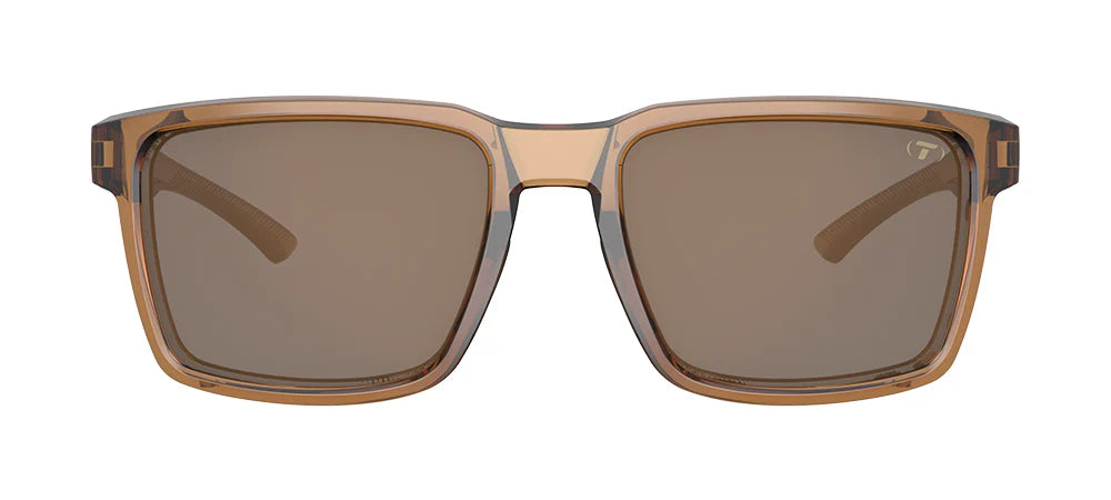The Tifosi Sylo Sunglasses featuring a translucent Honey frame with Polarized Brown lenses, highlighting the classic full-rim rectangular shape and warm lifestyle design.