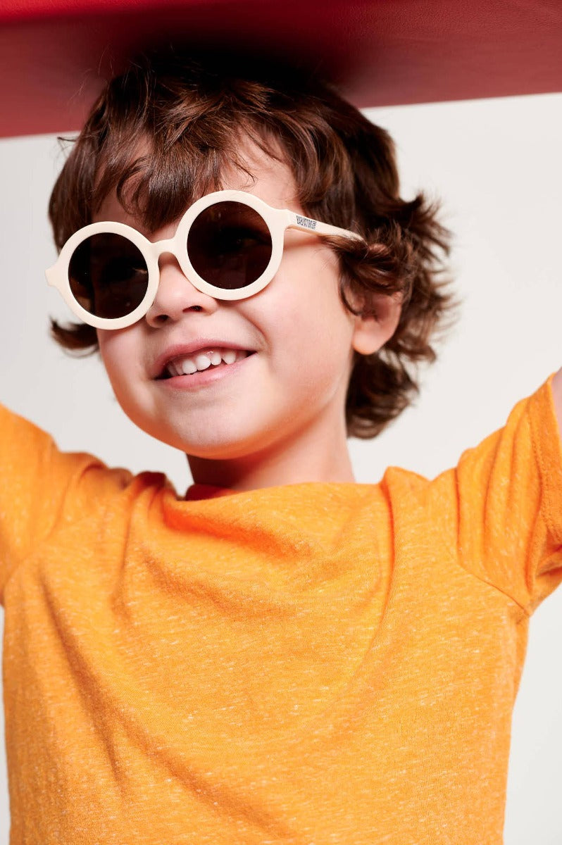 Boy wearing Babiators Euro Round sunglasses