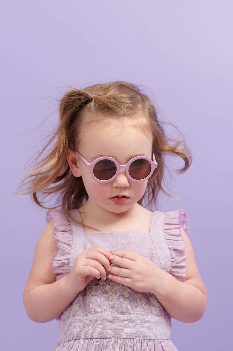 Kid wearing Babiators Euro Round sunglasses