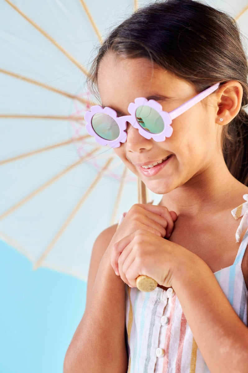 Girl wearing Babiators Flower sunglasses
