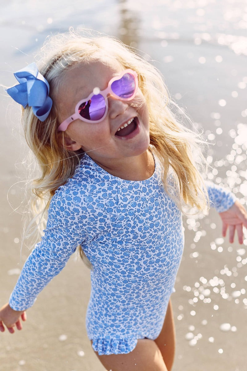 Kid wearing Babiators Hearts sunglasses