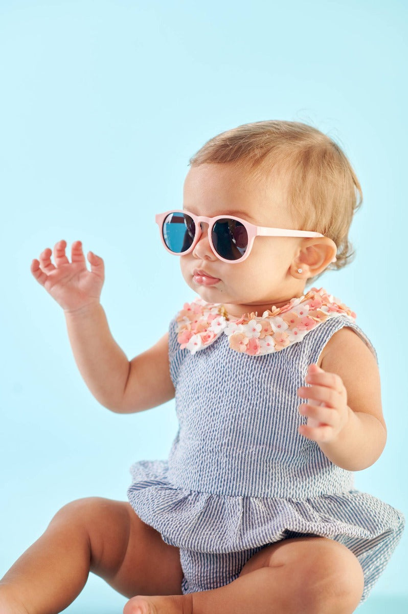 Baby wearing Babiator Keyhole Kids sunglasses