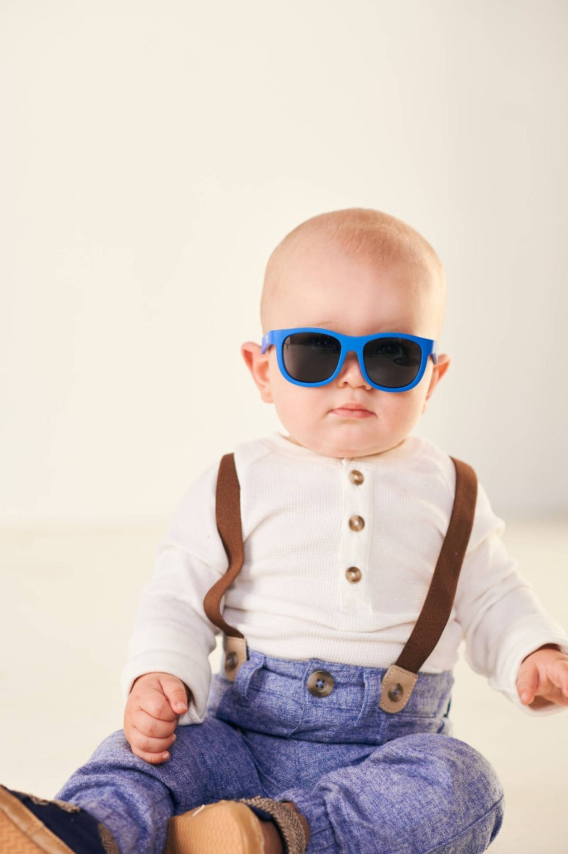baby wearing Babiators Navigator sunglasses