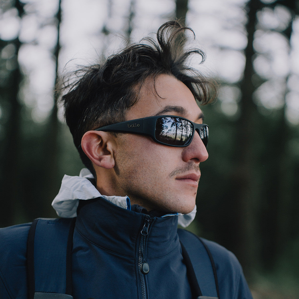 Person wearing Bolle King sunglasses