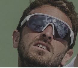 Tennis player wearing Bolle Lightshifter frames