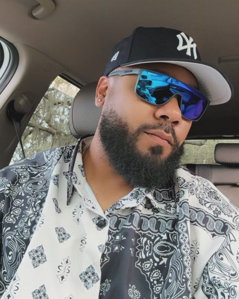 man wearing Tifosi Sanctum sunglasses