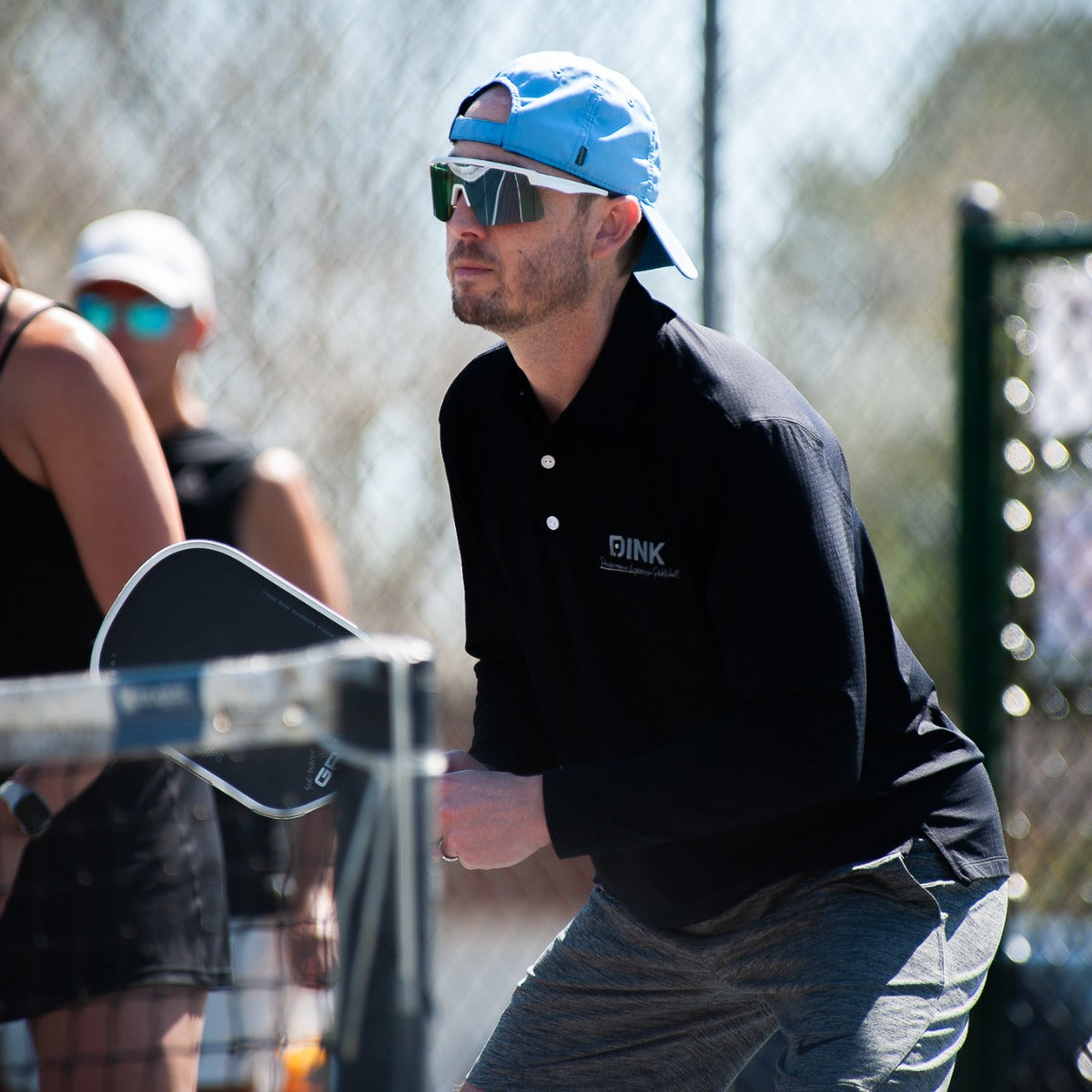 Pickleball player wearing Dink Captiva sunglasses