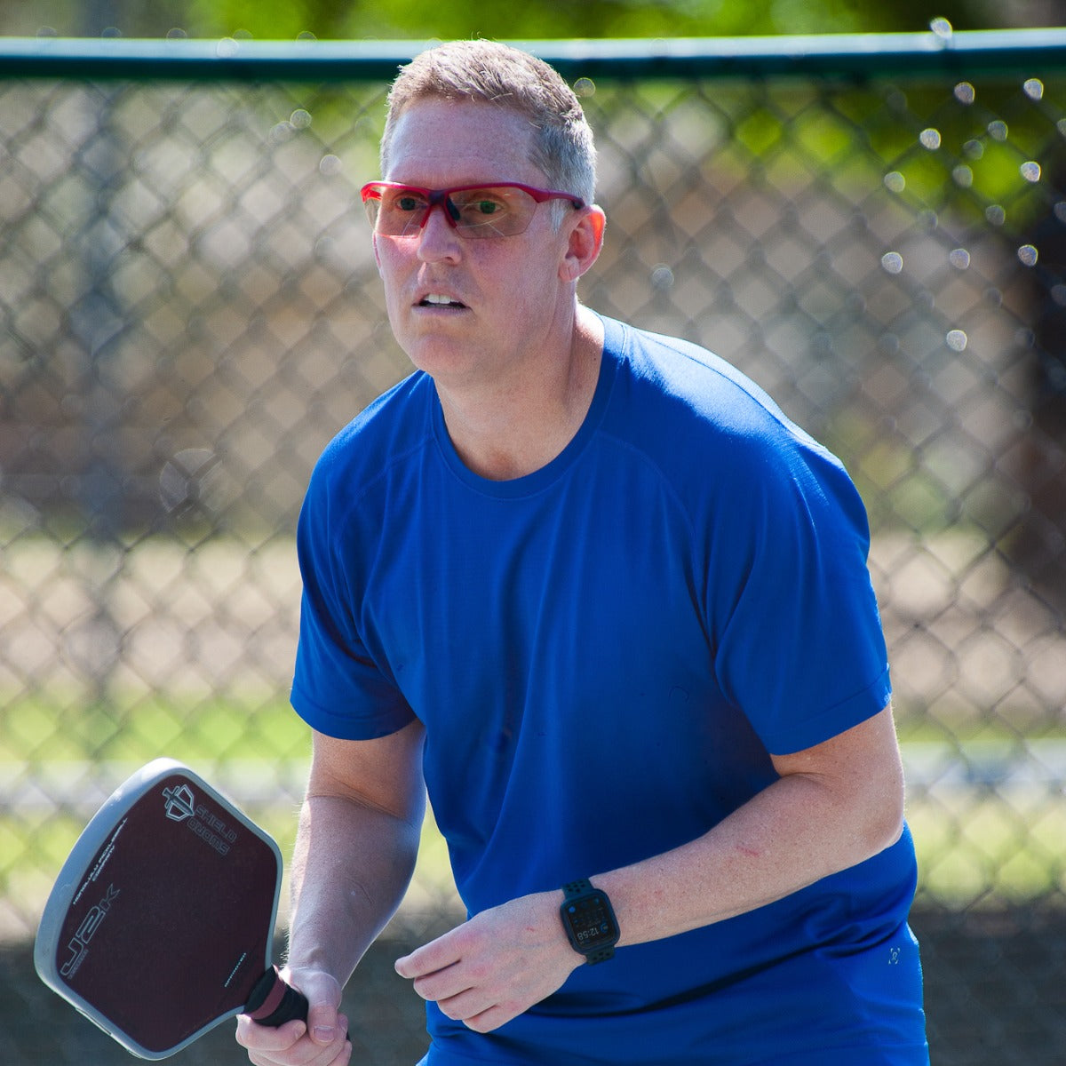 Man wearing Dink Naples Pickleball sunglasses