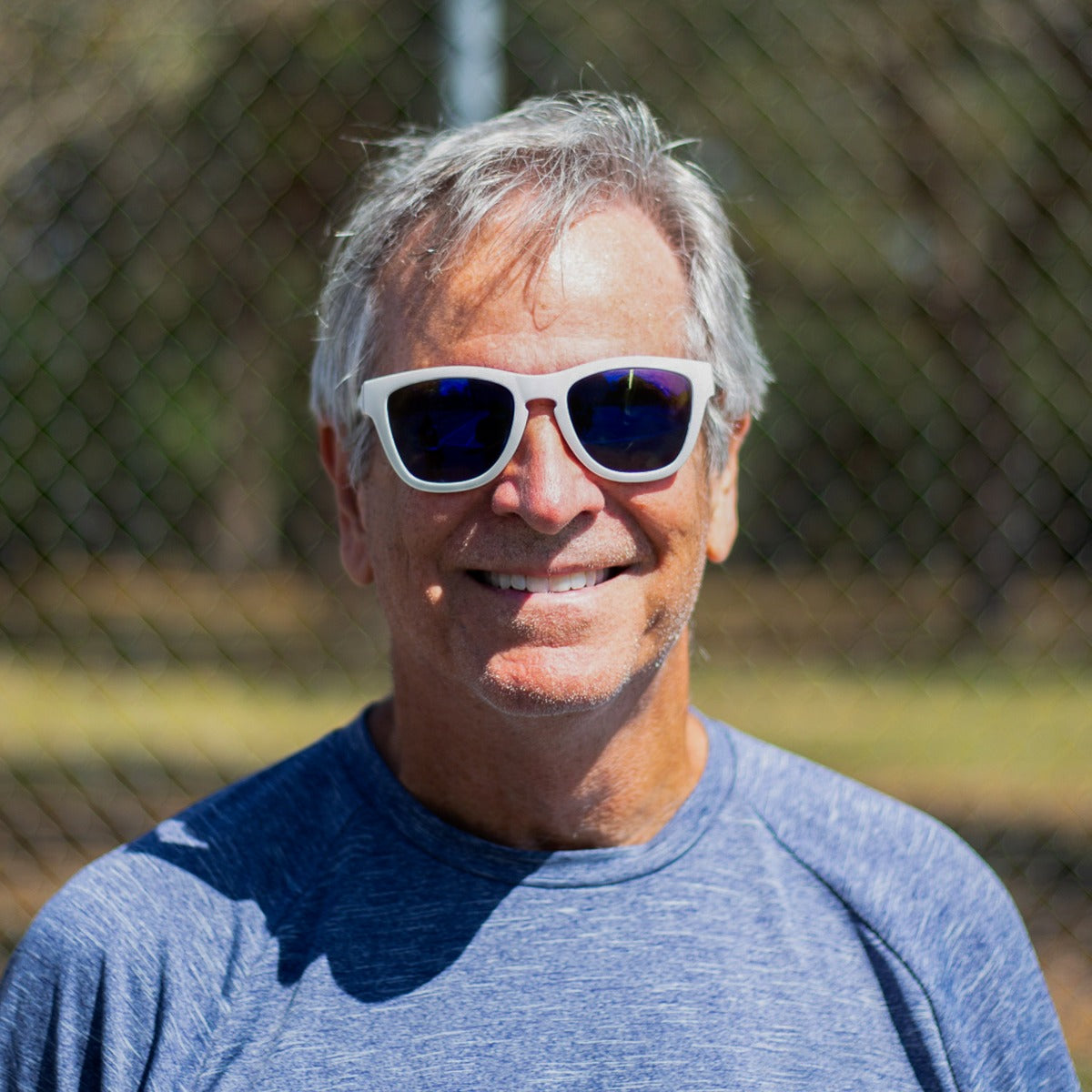 Person wearing Dink Key Largo pickleball sunglasses