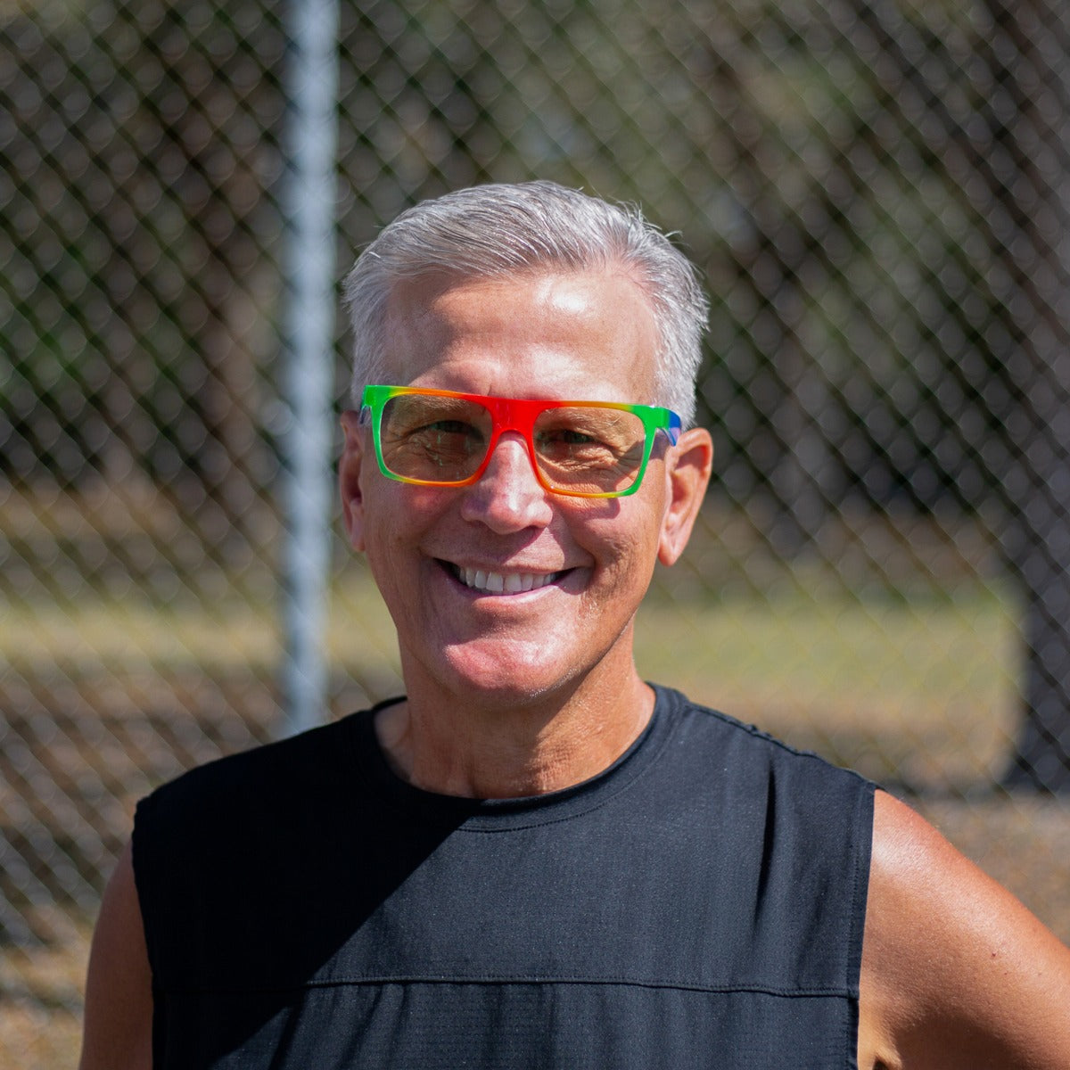 Person wearing Dink Sanibel pickleball sunglasses