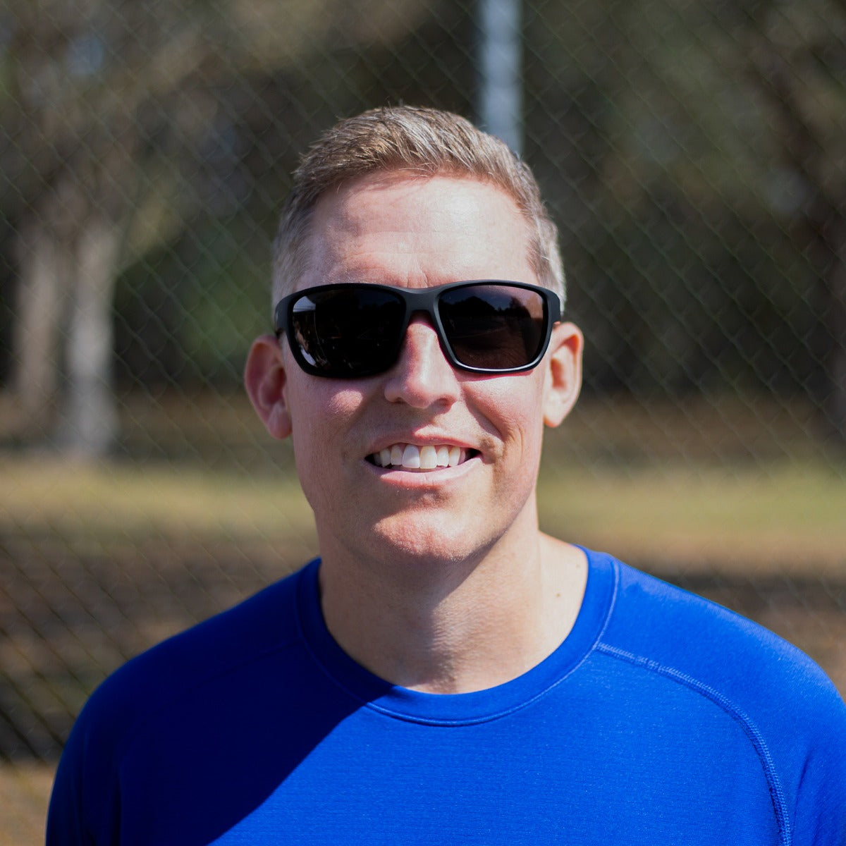 Man wearing Dink Orlando pickleball sunglasses