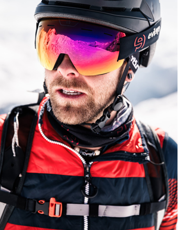 skier wearing Evil Eye Peaklite Ski goggles
