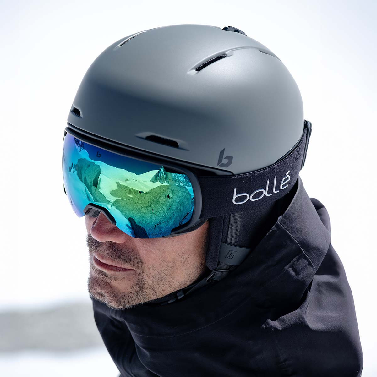 A man wearing a Bolle X7 OTG Ski Goggles