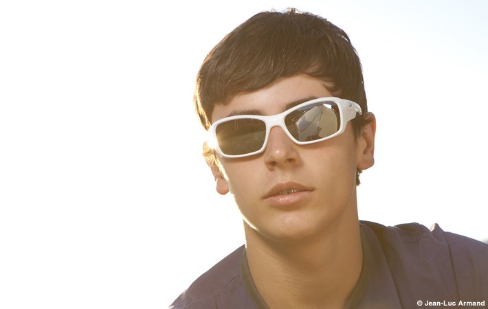 Kid wearing Julbo Rookie sunglasses