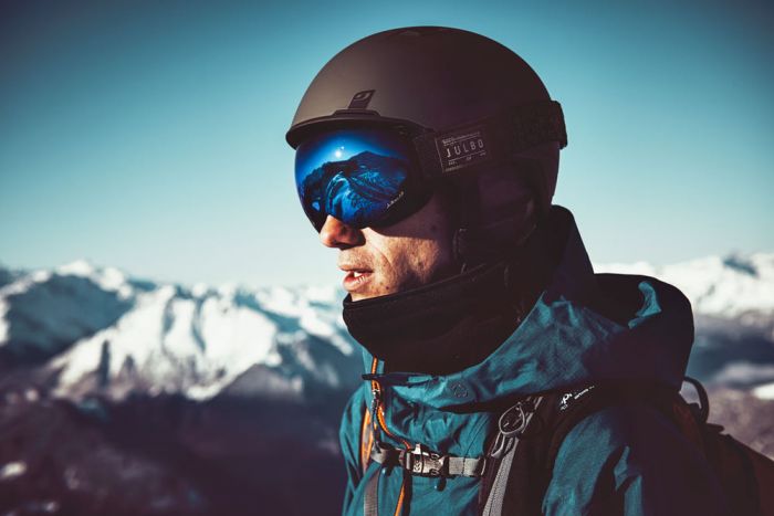 Skier wearing Julbo Shadow ski goggles
