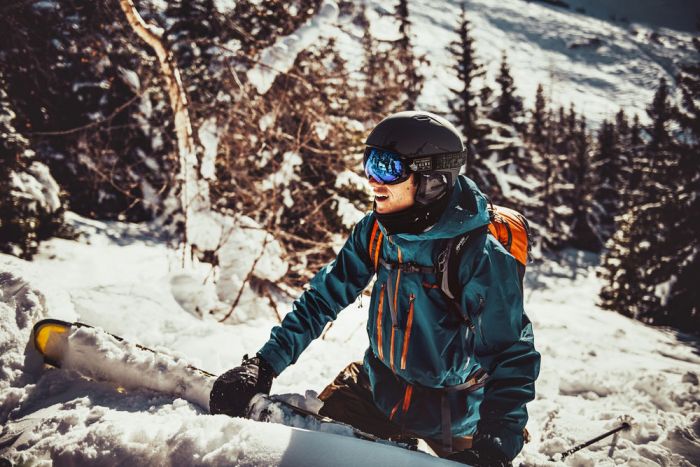 Snowboarder wearing Julbo Shadow snow goggles
