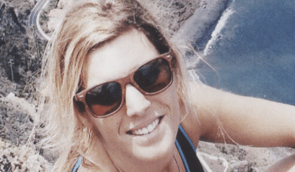 Woman wearing Ocean Beach Wood sunglasses