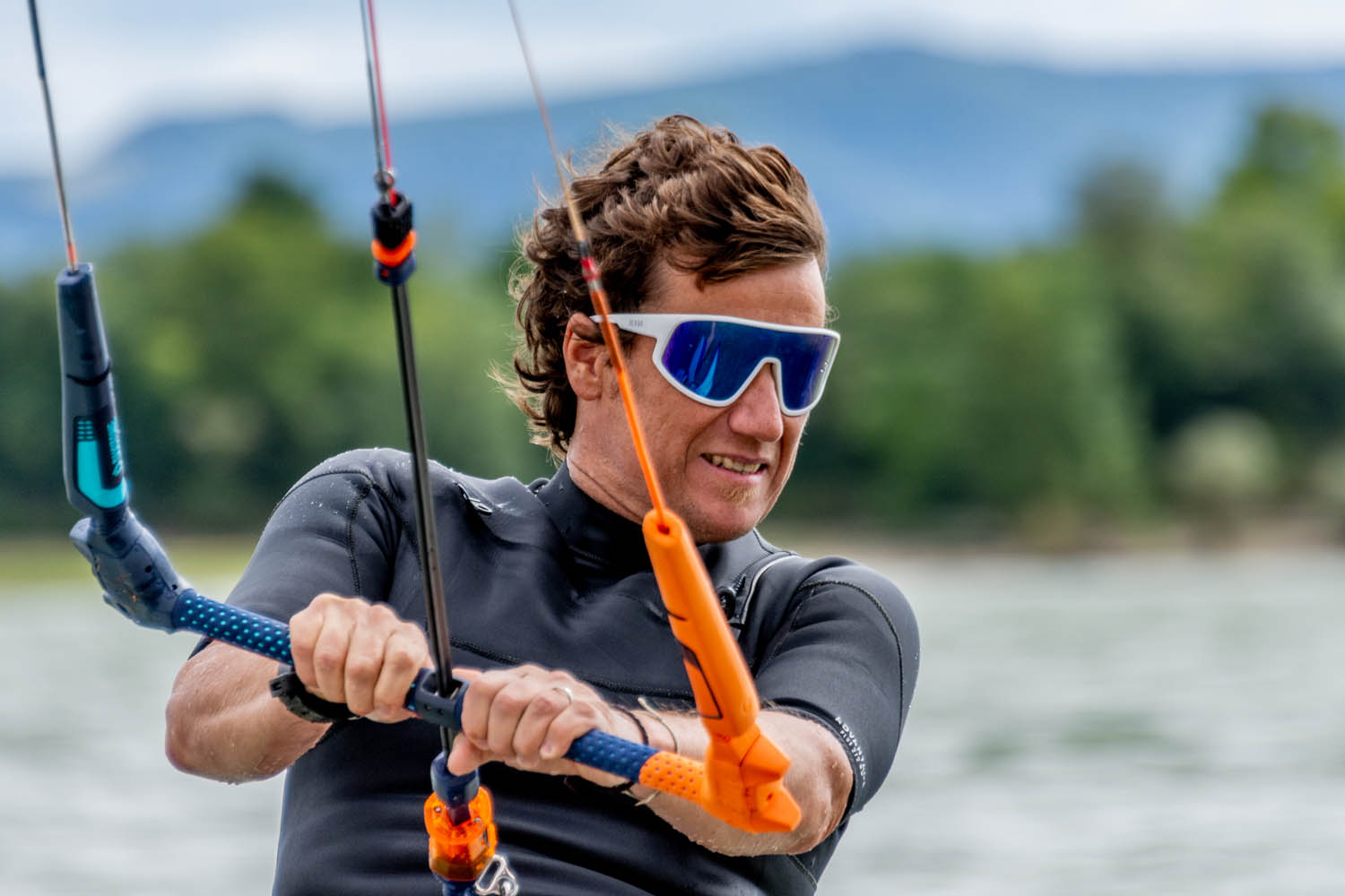 Kiteboarding wearing Ocean Killy sunglasses