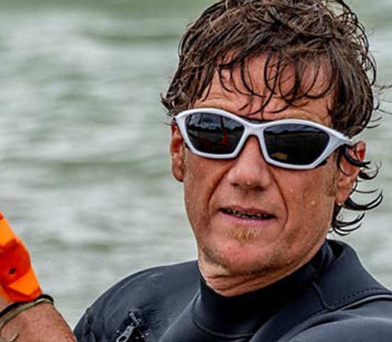 Kite surfer wearing Ocean Lake Garda sunglasses