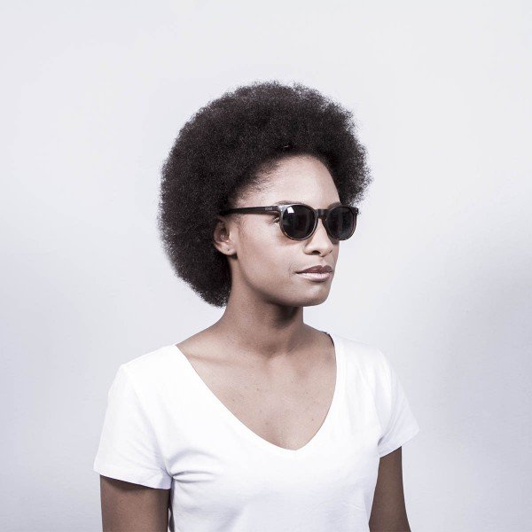 Woman wearing Ocean Lizard sunglasses