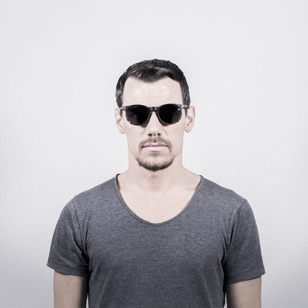 Man wearing Ocean Lizard sunglasses