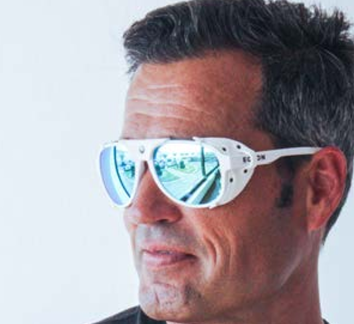 Person wearing Ocean Maui sunglasses