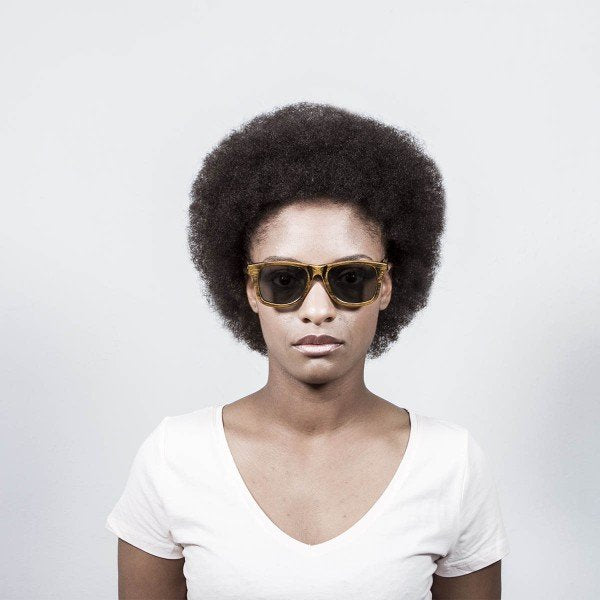 Woman wearing Ocean Nelson Bamboo Sunglasses
