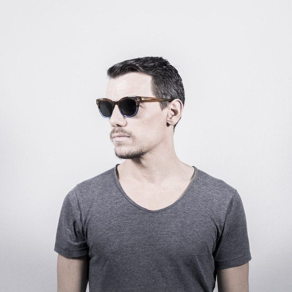 Person wearing Ocean Santa Cruz sunglasses