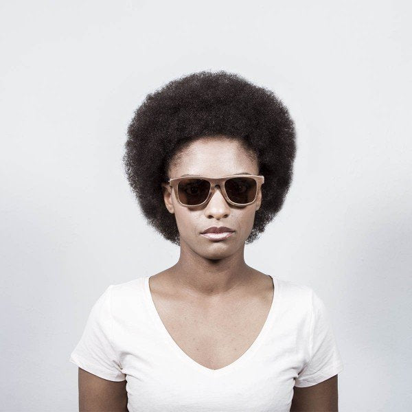 Woman wearing Ocean Venice Beach Skate Wood sunglasses