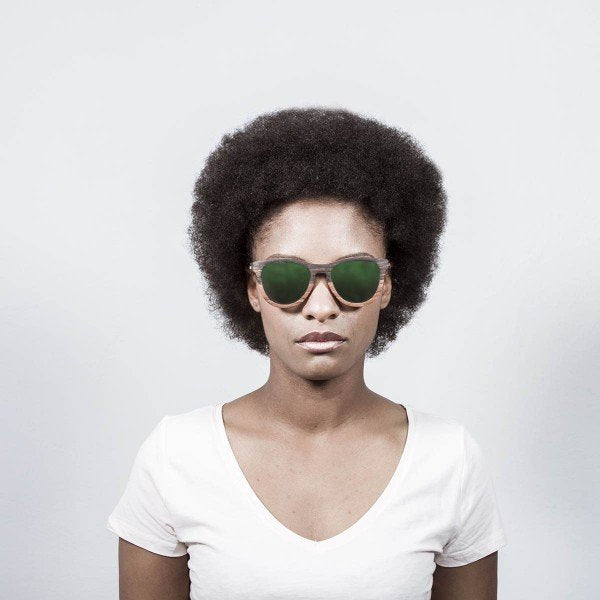 Woman wearing Ocean Wedge sunglasses