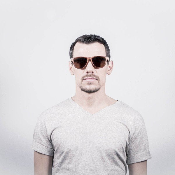 Man wearing Ocean Sea Wood sunglasses