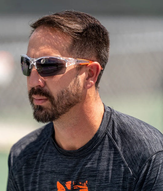 Pickleball player wearing Onix Owl sunglasses