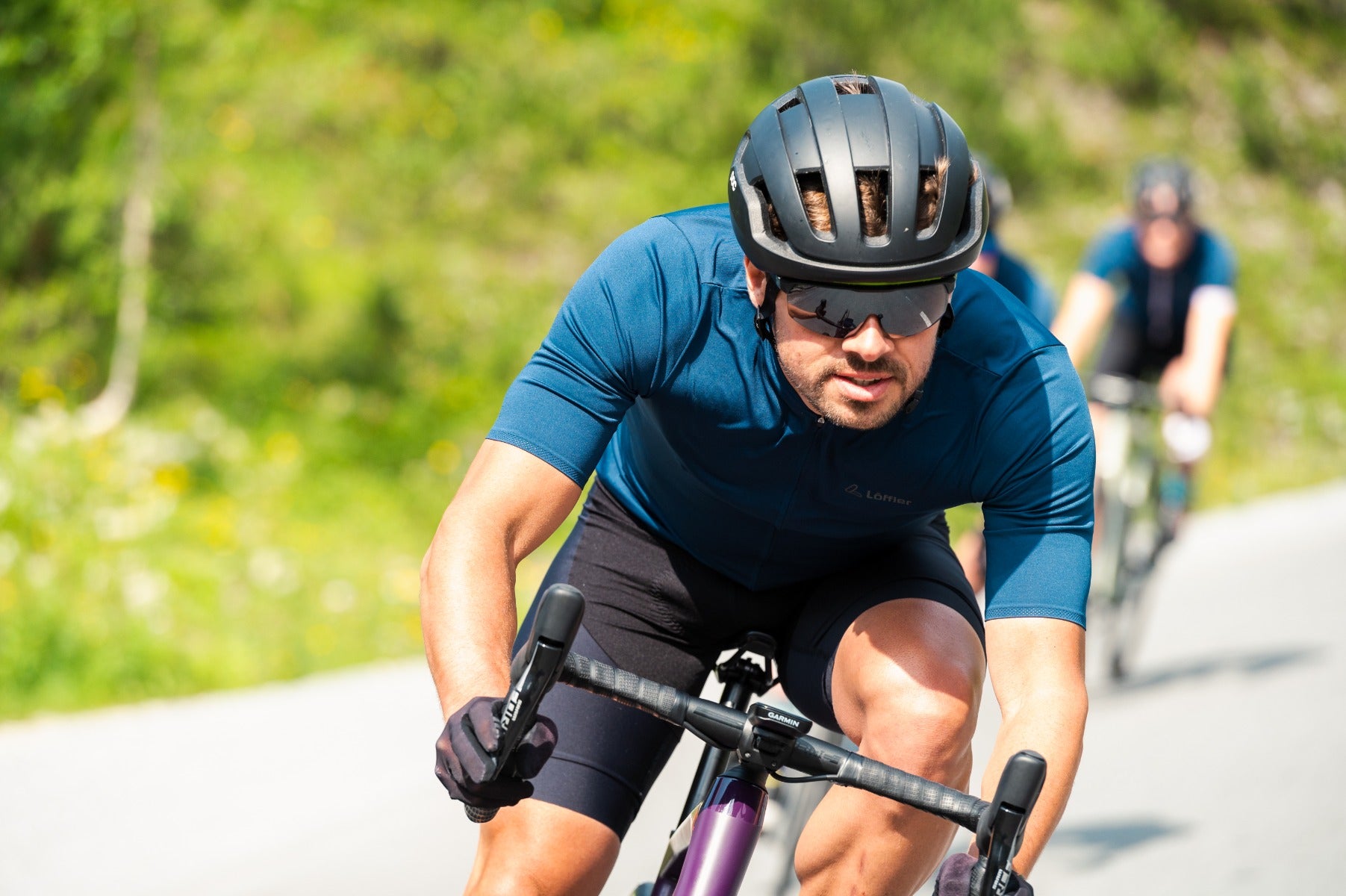 Cyclist wearing Evil Eye Traileye sunglasses