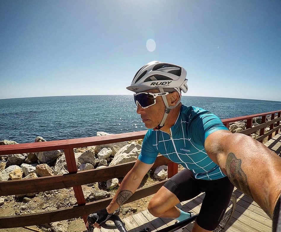 Cyclist wearing Rudy Project Cutline sunglasses