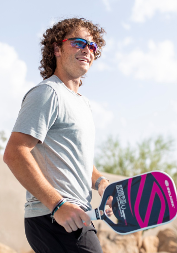 Pickleball player wearing Rudy Project Rydon sunglasses
