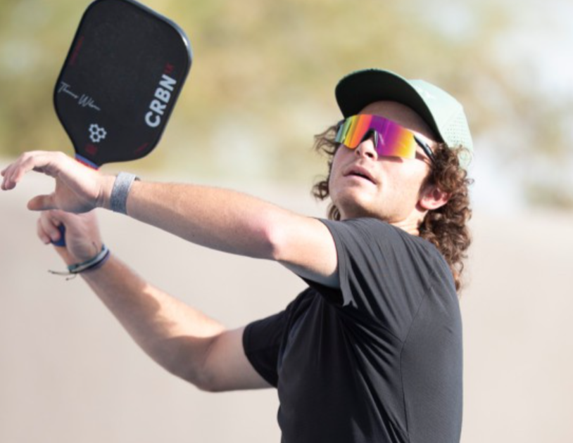 Pickleball player wearing Rudy Project Astral Sphere lenses