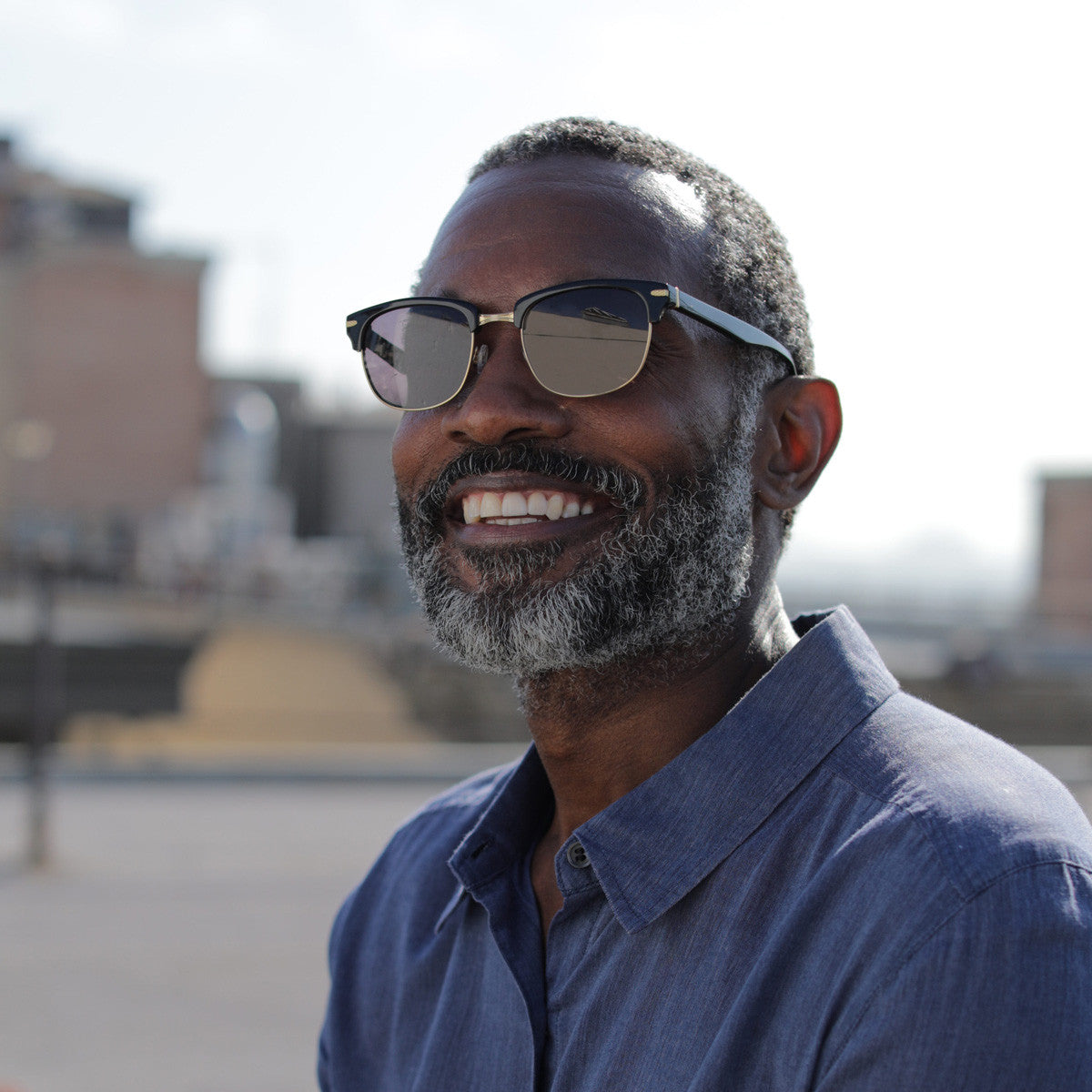 Person wearing Serengeti Chadwick sunglasses