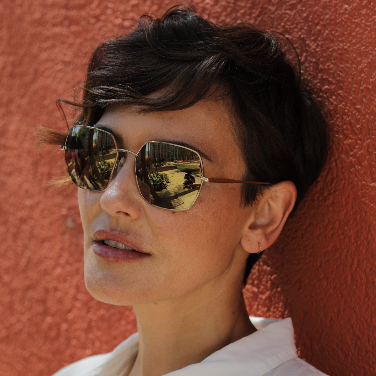 Person wearing Serengeti Loy sunglasses