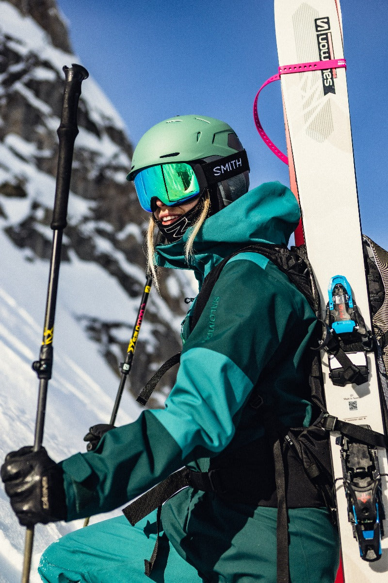 Woman wearing Smith 4D Mag S snow goggles