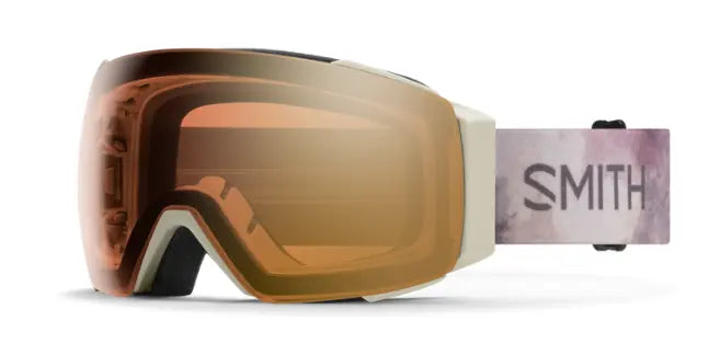 Smith i/o ski goggles in beach with Photochromic Gold Mirror lenses